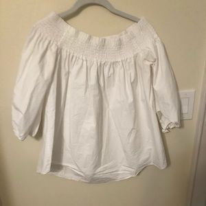 Off-the-shoulder white linen top